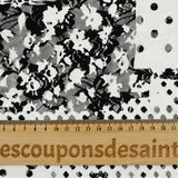 Dentelle polyester imprimée fantaisie noir sur fond blanc