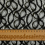 Dentelle polyester fleurs dorées brodées lurex noir