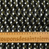 Dentelle polyester ajourée vagues lurex doré et noir