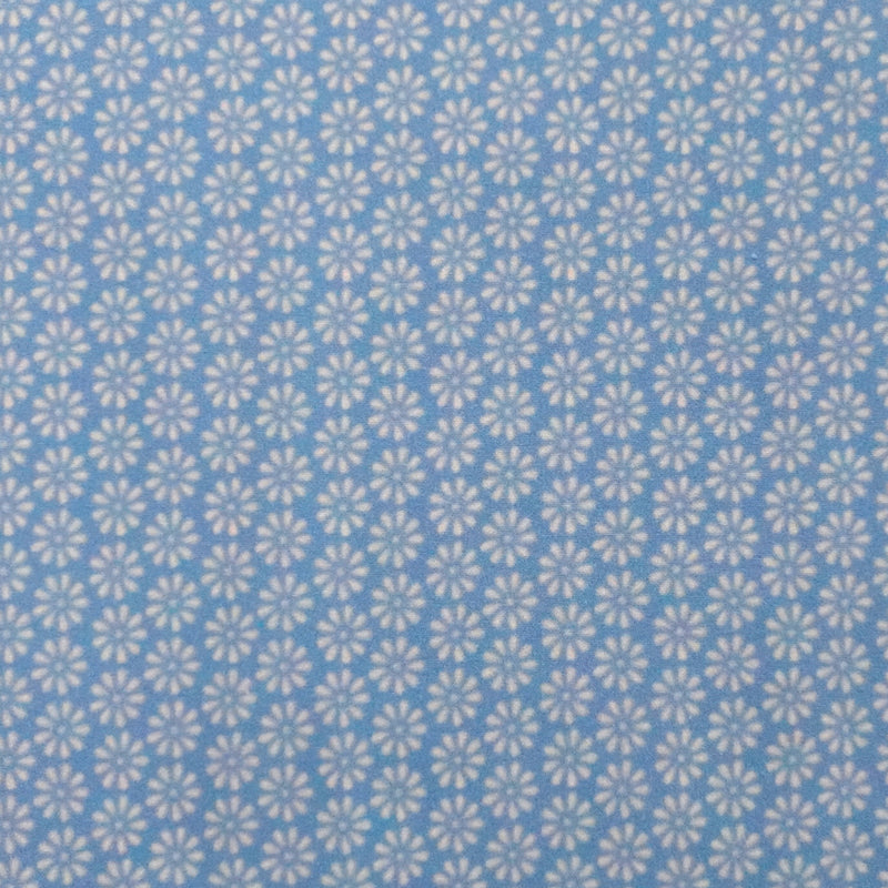Coton imprimé marguerite fond bleu