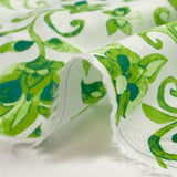 Voile de coton imprimé jardin persan vert fond blanc