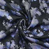 Sergé de coton imprimé vitalité bleu et gris fond noir