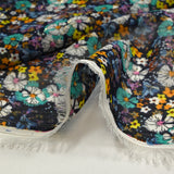 Mousseline crinkle imprimée lurex prairie fleurie turquoise fond marine