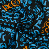 Satin de coton léger imprimé graffitis bleu et orange fond noir