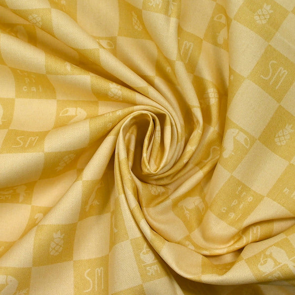 Sergé de coton imprimé damier tropical jaune pâle et moutarde