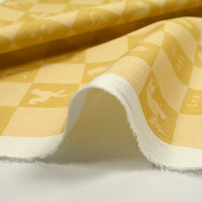 Sergé de coton imprimé damier tropical jaune pâle et moutarde