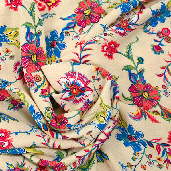 Viscose imprimée liane de fleurs bleu fond sable