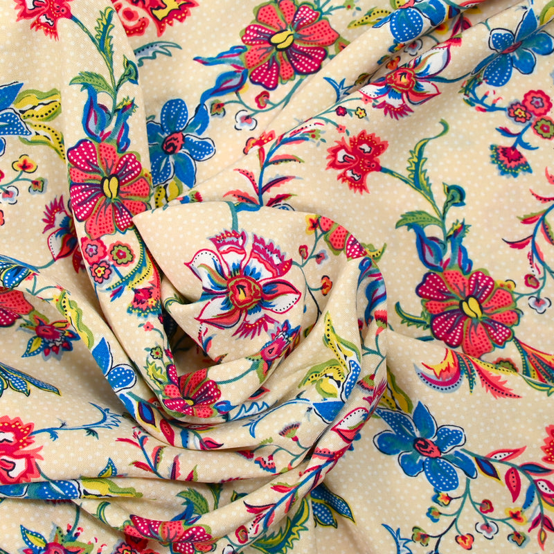 Viscose imprimée liane de fleurs bleu fond sable