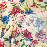 Viscose imprimée liane de fleurs bleu fond sable