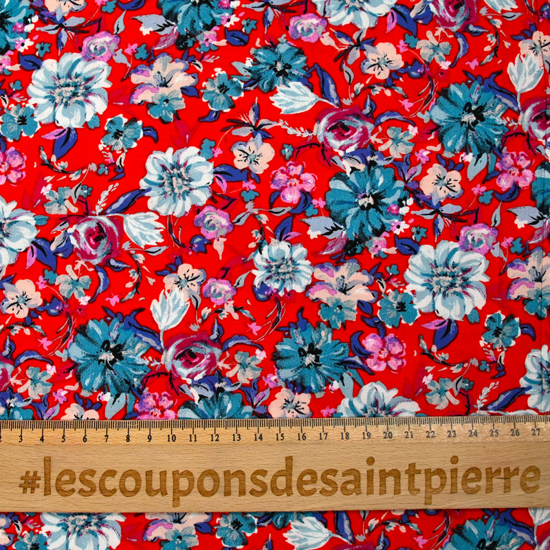 Viscose imprimée fleurs turquoise fond rouge