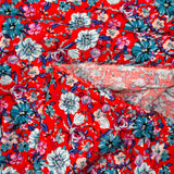 Viscose imprimée fleurs turquoise fond rouge