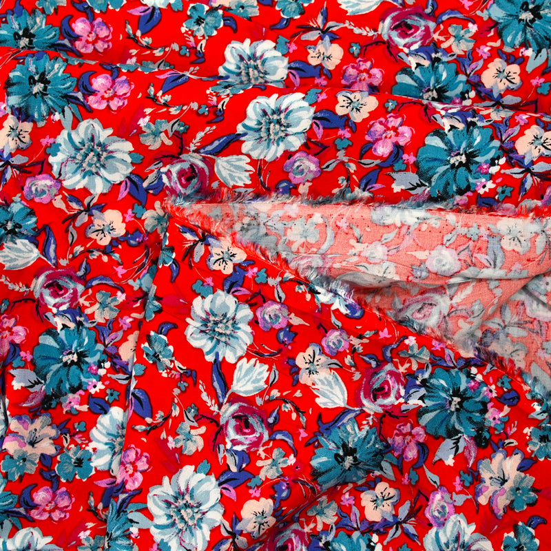 Viscose imprimée fleurs turquoise fond rouge