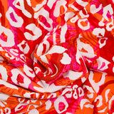 Viscose imprimée léopard rose et orange