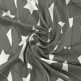 Fine viscose satin with black and off-white intertwined star print