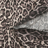 Satin de coton élasthanne léopard fond beige