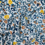 Polaire doudou imprimée léopard jaune et bleu glacier