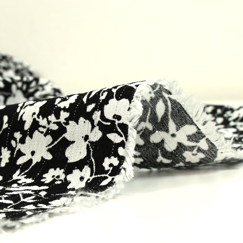 Crépon viscose rayé lurex argent fleurs fond noir