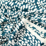 Satin polyester tache fond vert