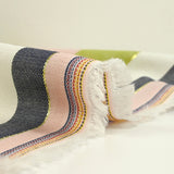 Viscosa estampada línea dorada con rayas verdes y rosas.