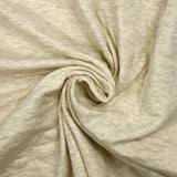 Heathered ecru quilted cotton jersey
