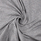 Jersey de coton moucheté coloré fond gris