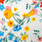 Sergé de coton élasthanne fleurs du jardin fond blanc