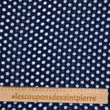 Mousseline de polyester imprimée pois blanc fond marine