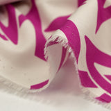 Star printed cotton poplin in magenta off-white background