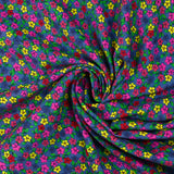 Velours de coton côtelé imprimé petites fleurs colorées fond bleu barbeau