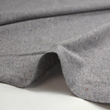 Jersey de coton moucheté coloré fond gris