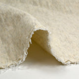 Heathered ecru quilted cotton jersey