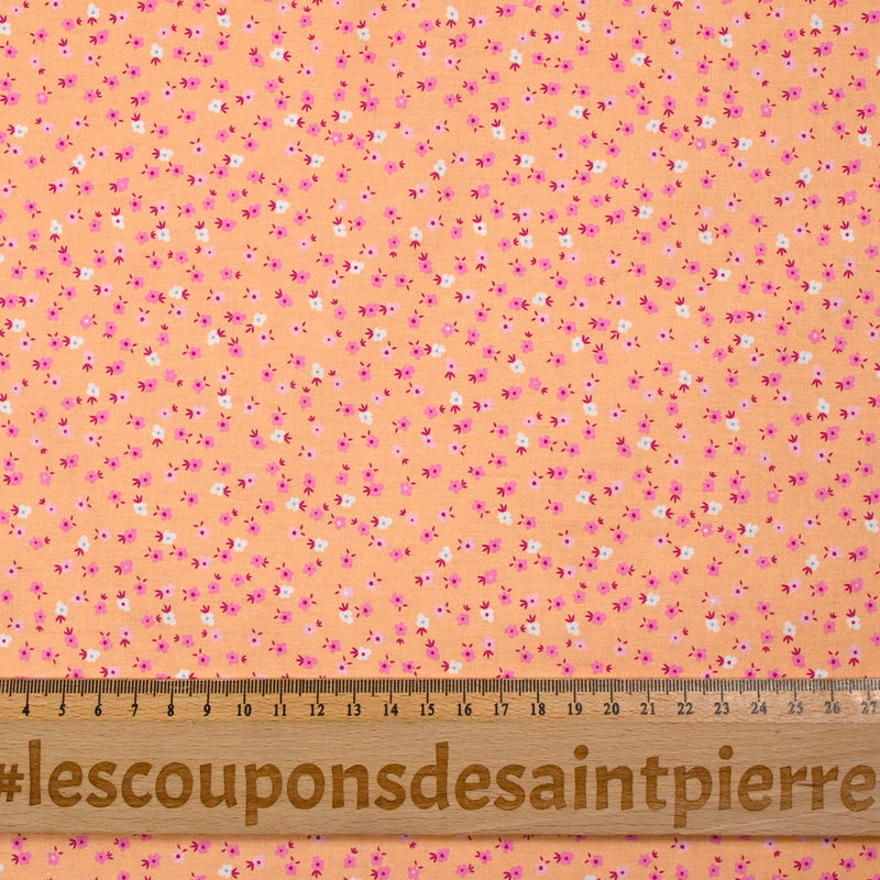 Cotton printed mini flowers salmon background