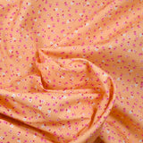 Cotton printed mini flowers salmon background