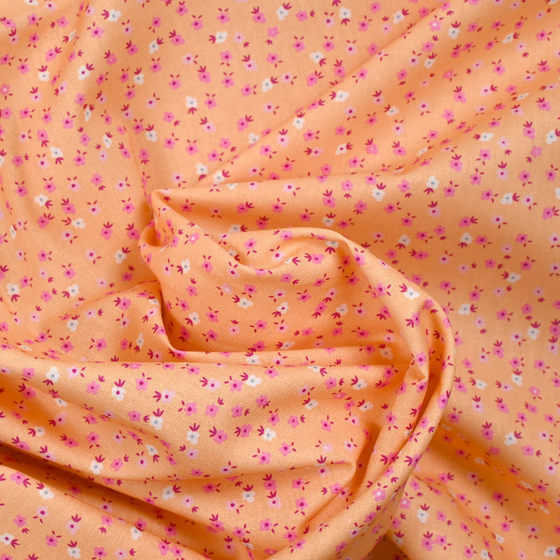 Cotton printed mini flowers salmon background