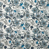 Coton matelassé double face Mayla fleurs bleu fond blanc au mètre