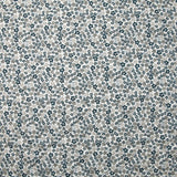 Coton matelassé double face Mayla fleurs bleu fond blanc au mètre