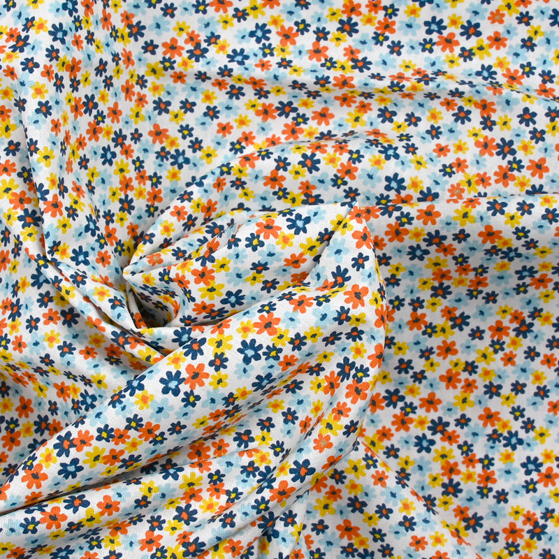 Coton imprimé fleurs de Chantale ciel et moutarde
