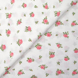 Coton imprimé les fleurs de Lou rose fond blanc
