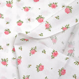 Coton imprimé les fleurs de Lou rose fond blanc