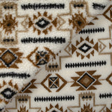 Fausse fourrure sherpa aztèque marron fond blanc cassé