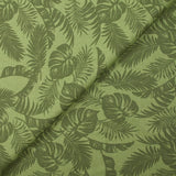 Coton imprimé envolée de feuilles fond vert