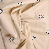 Coton imprimé panda fond sable rosé
