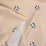 Coton imprimé panda fond sable rosé