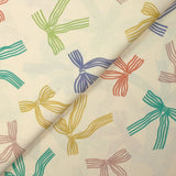 Lazos de cinta estampada de algodón con fondo crudo