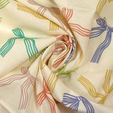 Lazos de cinta estampada de algodón con fondo crudo