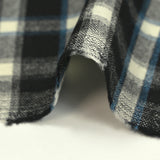 Flanelle de laine à carreaux blanc cassé et bleu fond noir