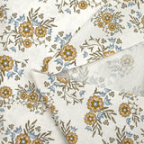 Algodón estampado con flores Naïla fondo blanco roto