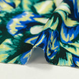 Satin viscose knit with blue hydrangea black background print