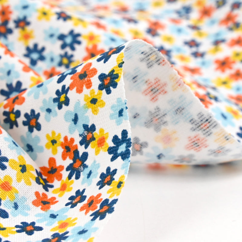 Coton imprimé fleurs de Chantale ciel et moutarde