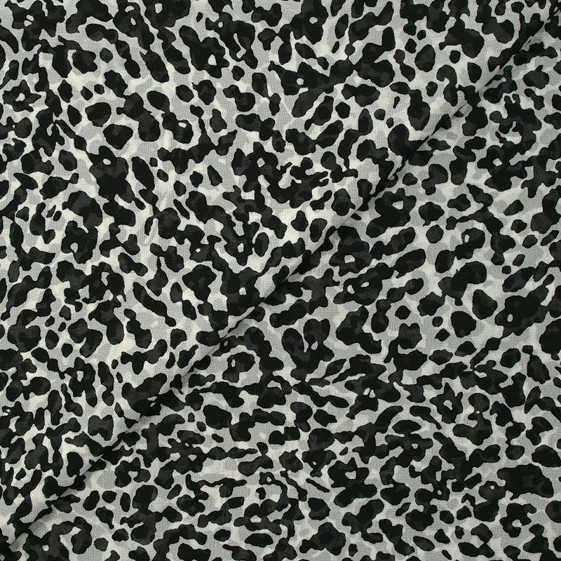 Mousseline imprimée animosité fond blanc